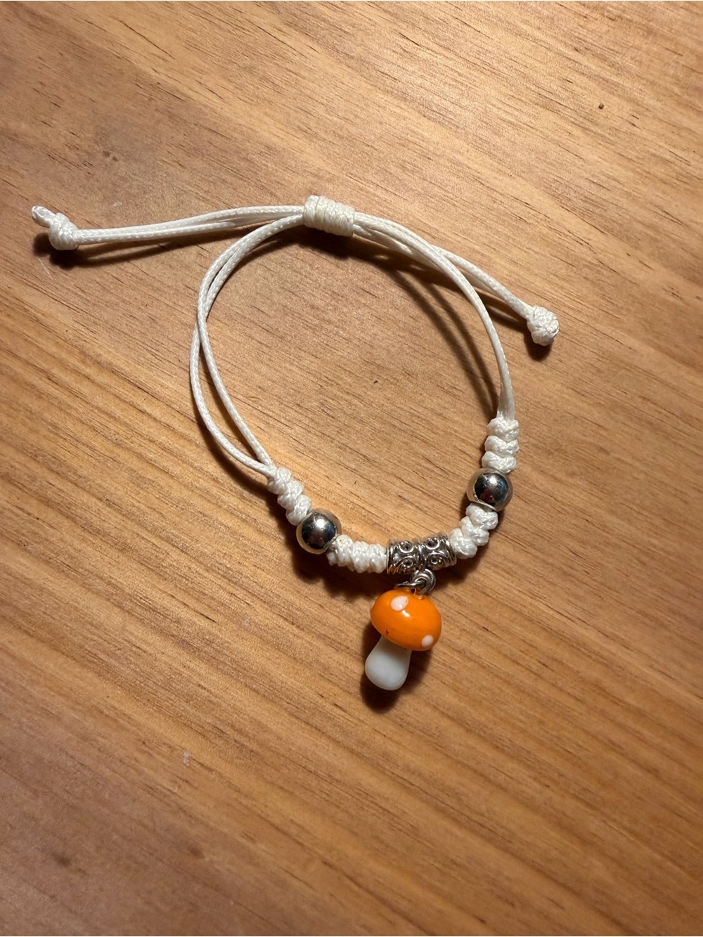 White Cord Bracelet with Orange Mushroom Charm